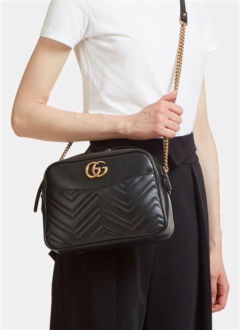 GG Marmont Small Shoulder Bag Matelassé .